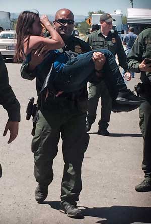 tca agent carries injured woman
